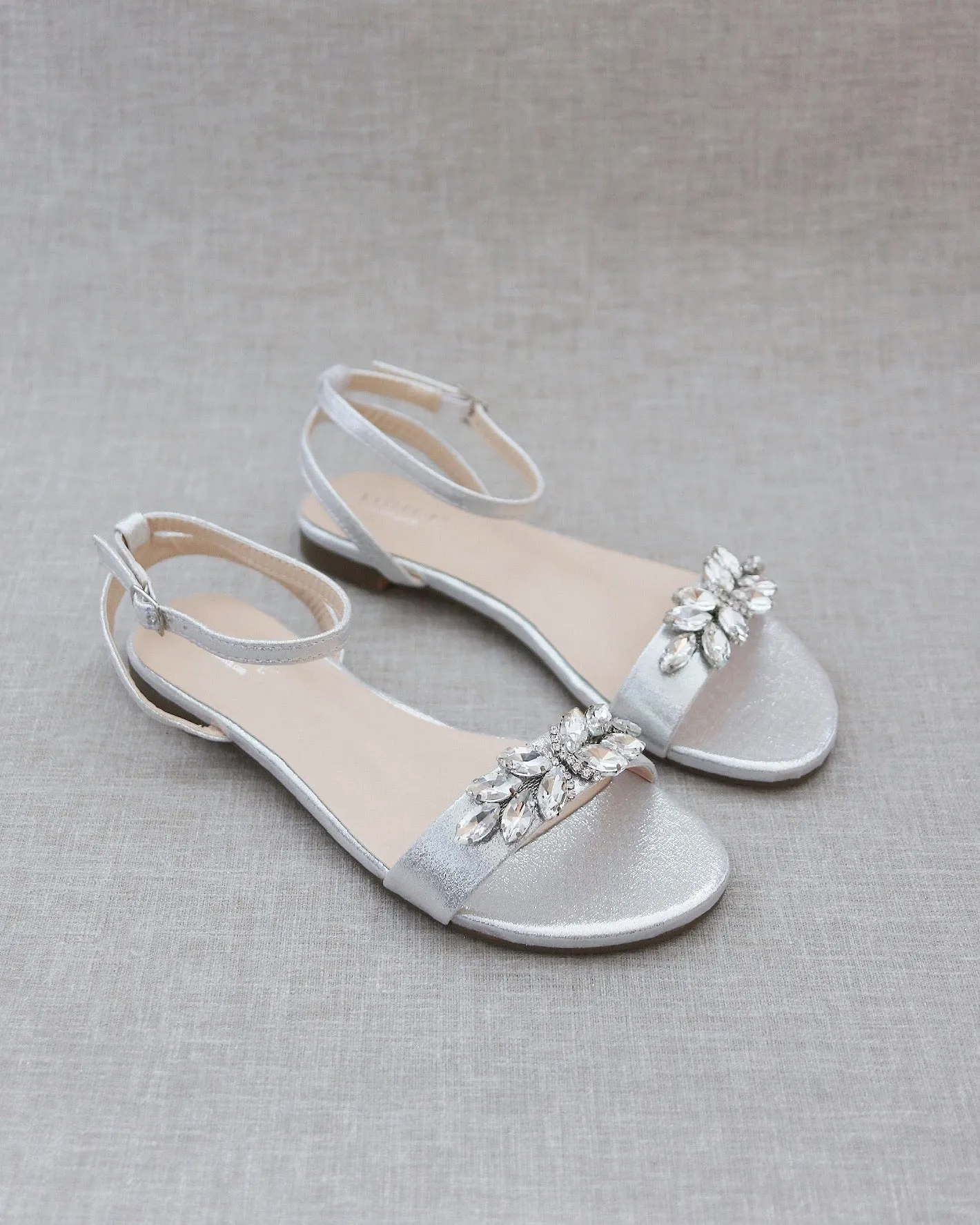 Metallic Flat Sandal with Butterfly Brooch and Ankle Strap