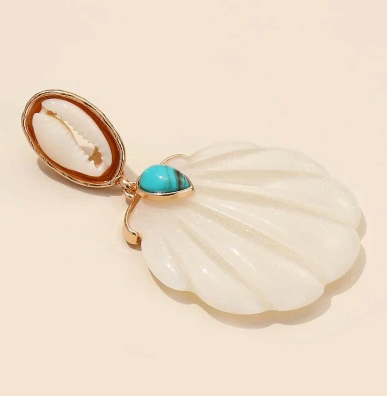 Shell decor turquoise and cream colored dangle earrings
